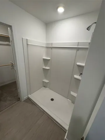 a bathroom with a bath tub