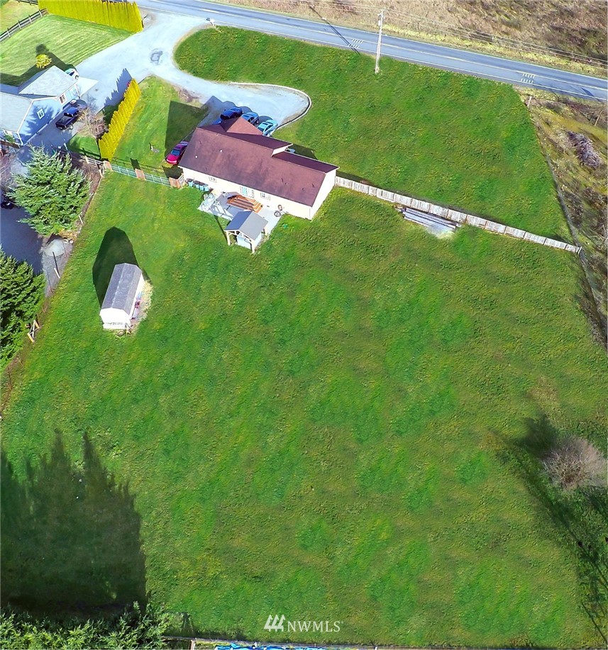 18131 Case Road Southwest Rochester, WA 98579 - Photo 2 of 16 a view of a yard with an outdoor space