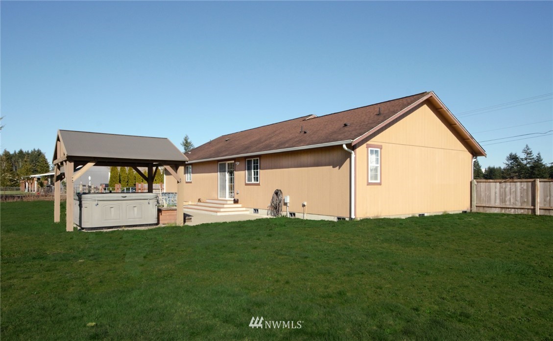 18131 Case Road Southwest Rochester, WA 98579 - Photo 16 of 16 a front view of a house with a yard and porch