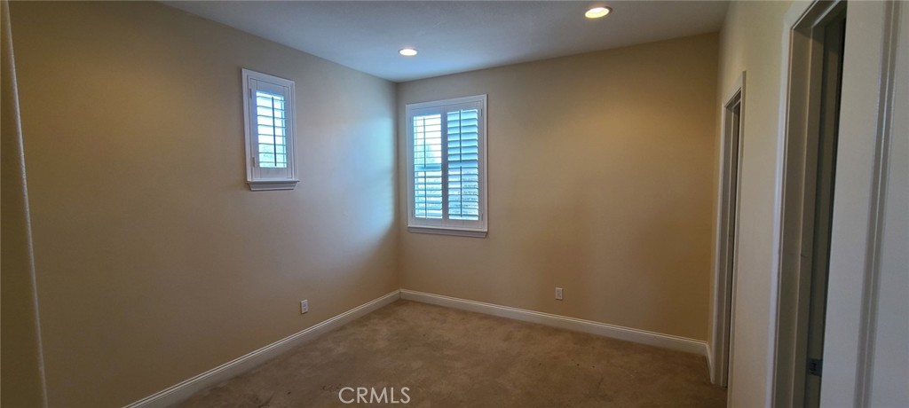 13209 Lima Drive Rancho Cucamonga, CA 91739 - Photo 17 of 25 a view of an empty room with a window