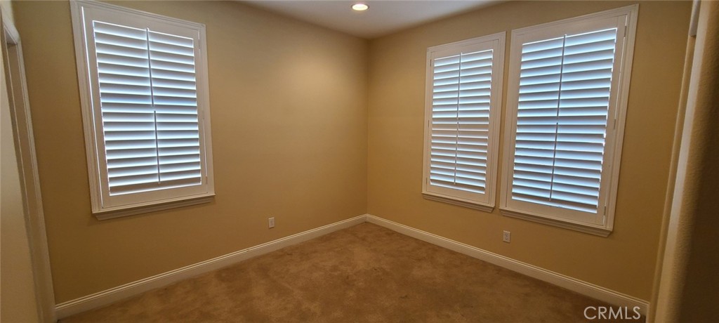 13209 Lima Drive Rancho Cucamonga, CA 91739 - Photo 10 of 25 a view of a room that has a window in it