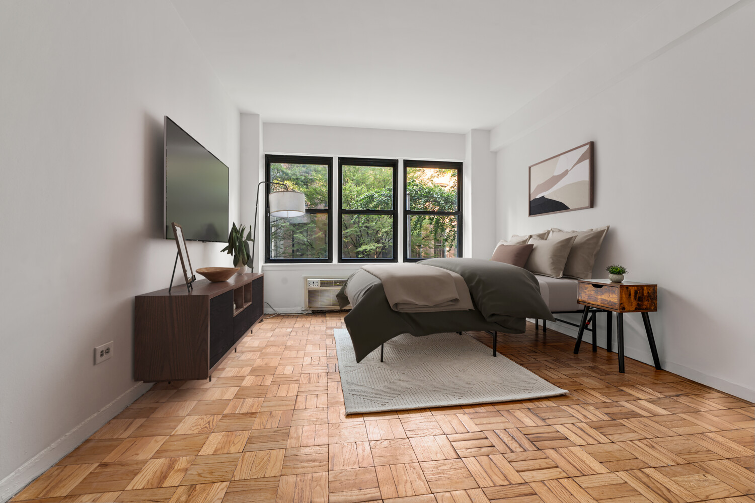 120 East 36th Street, Unit 3F Manhattan, NY 10016 - Photo 3 of 7 a living room with furniture and a rug