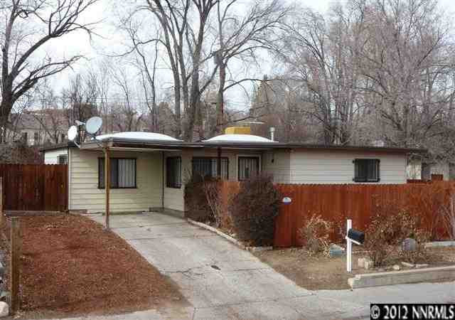 1625 Beech Street Reno, NV 89512 - Photo 1 of 1 a front view of a house with a yard