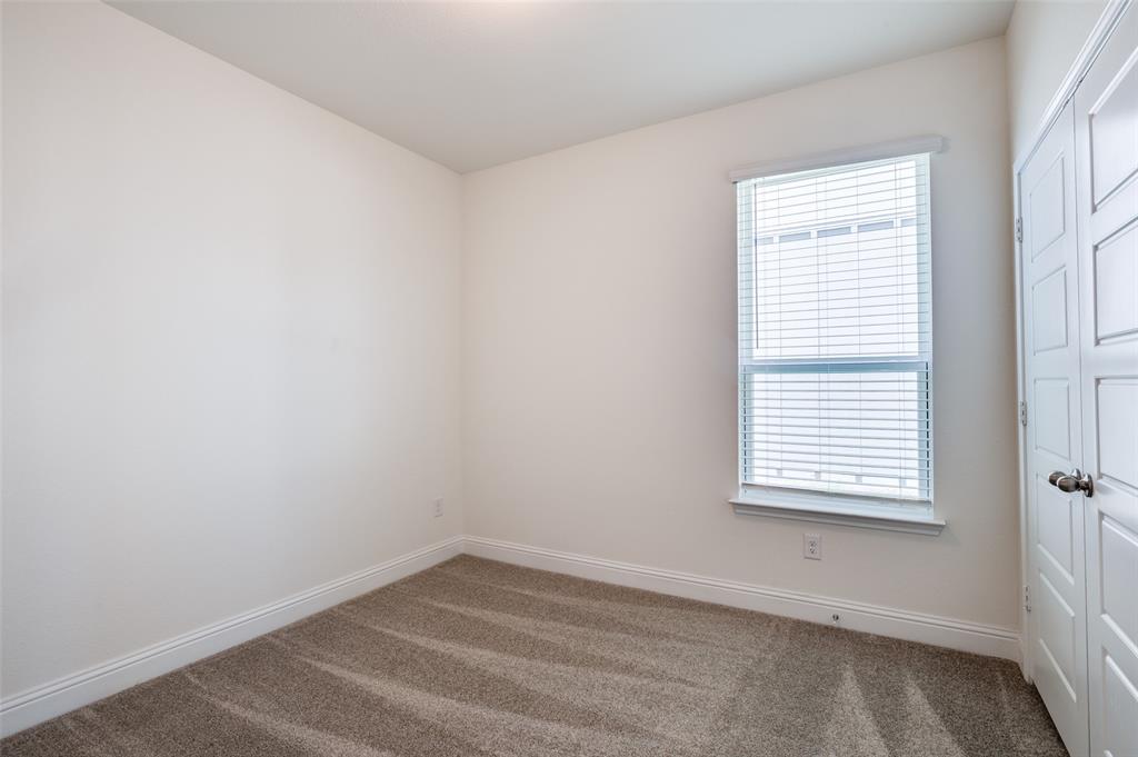 344 Fallbrook Drive Aledo, TX 76008 - Photo 12 of 28 an empty room with a window