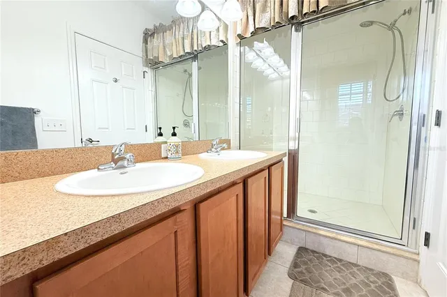a bathroom with a toilet a sink and a mirror
