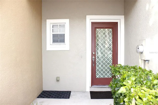 a view of walk in closet with wooden floor