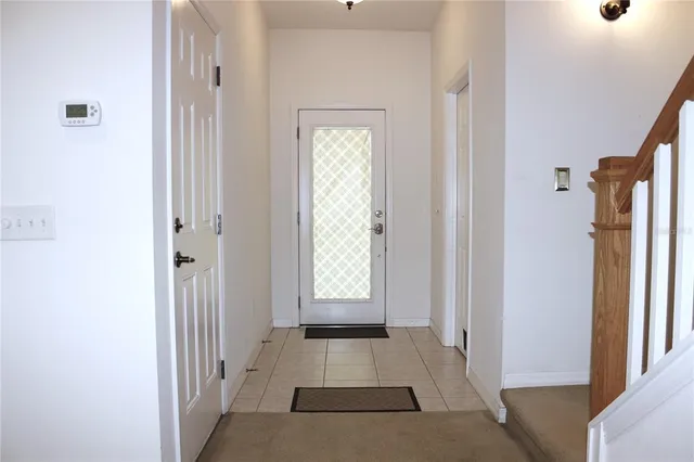 a view of an entryway with a livingroom