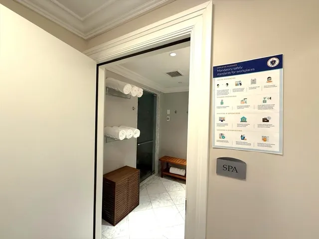 a bedroom with a bed and a table