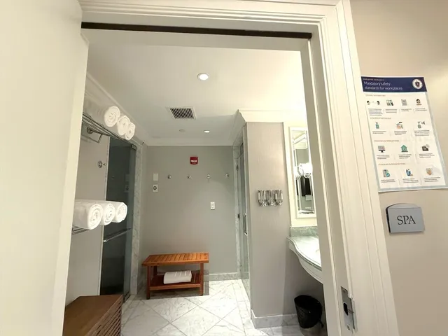 a bathroom with a sink and mirror