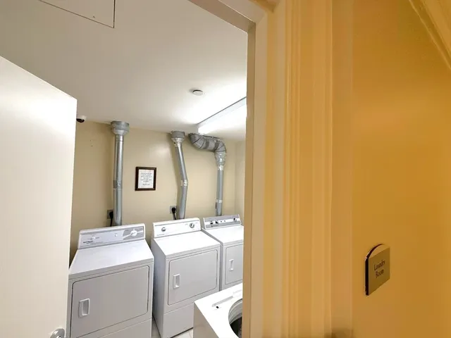 a street view with tall buildings