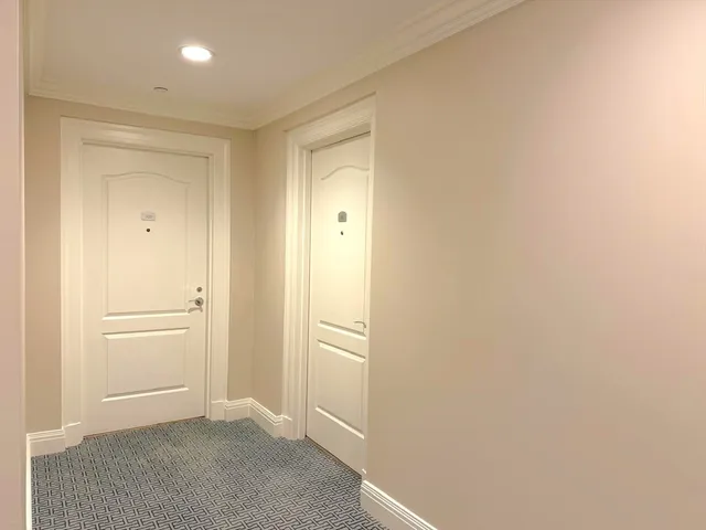 a kitchen with stainless steel appliances a refrigerator sink and stove