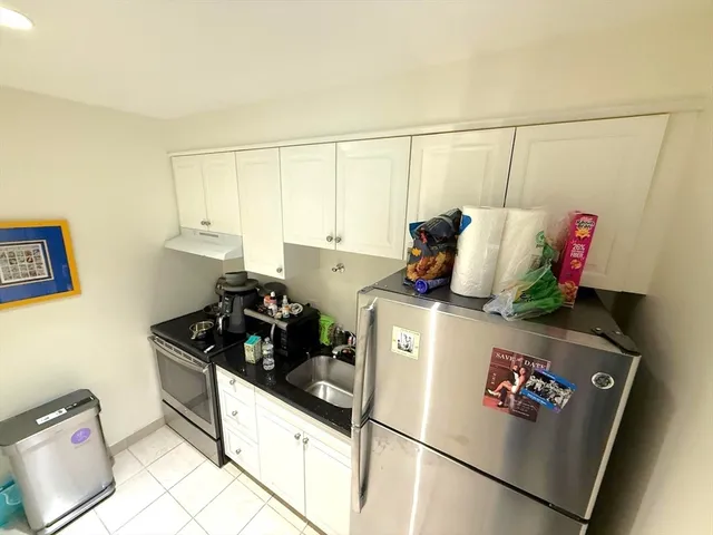 a view of a hallway with closet