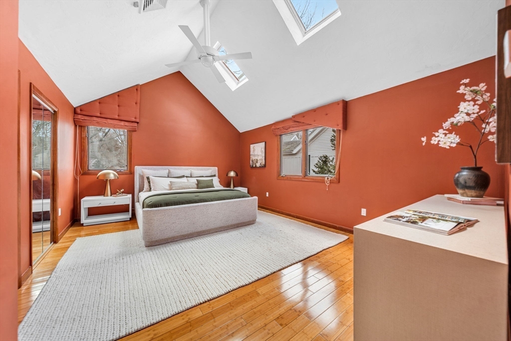 16 Carthay Circle, Unit 16 Newton, MA 02461 - Photo 16 of 29 a bedroom with furniture and a bed