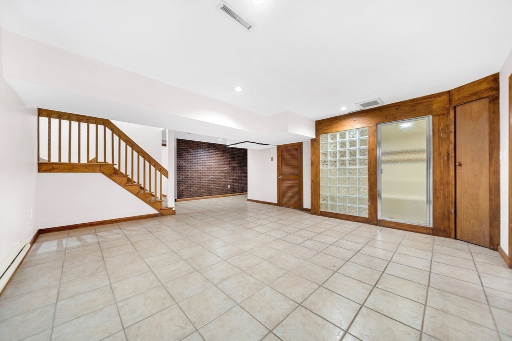 16 Carthay Circle, Unit 16 Newton, MA 02461 - Photo 23 of 29 a view of an empty room