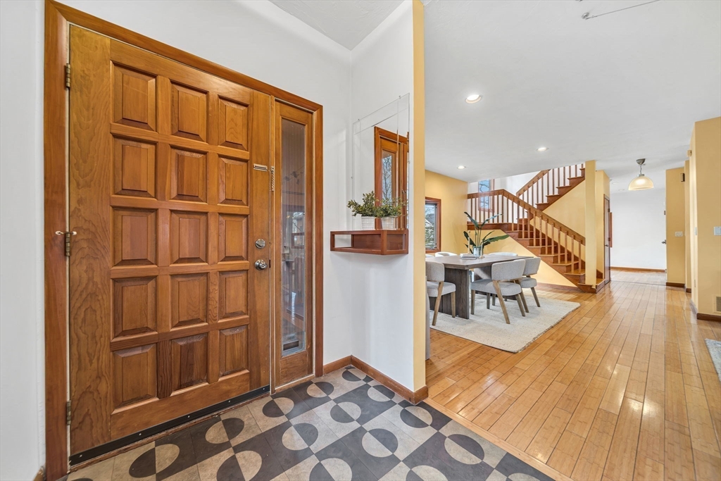 16 Carthay Circle, Unit 16 Newton, MA 02461 - Photo 4 of 29 a view of living room filled with furniture and wooden floor