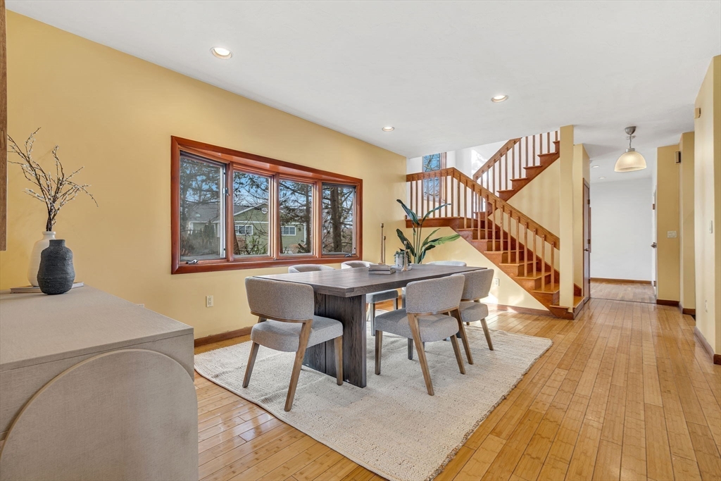 16 Carthay Circle, Unit 16 Newton, MA 02461 - Photo 5 of 29 a dining room with furniture and wooden floor