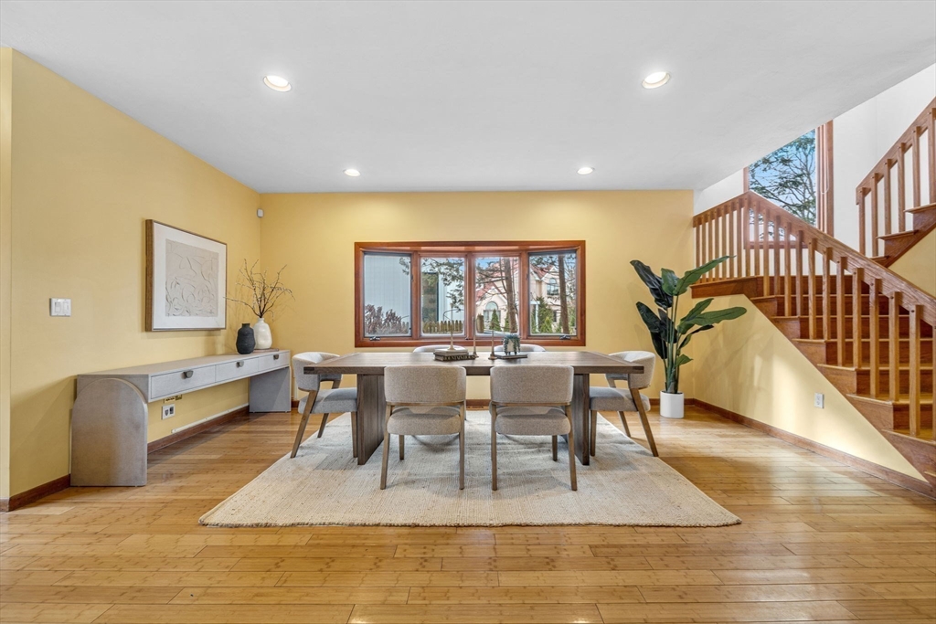 16 Carthay Circle, Unit 16 Newton, MA 02461 - Photo 6 of 29 a view of a dining room with furniture window and wooden floor