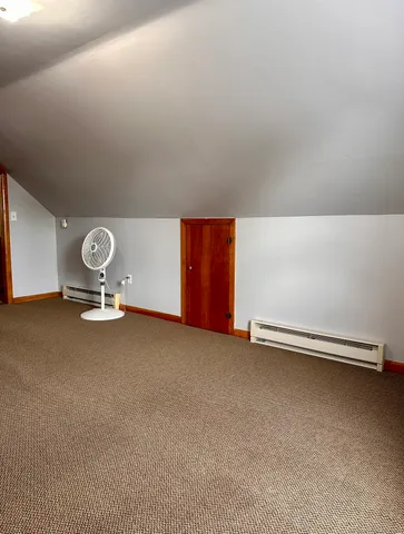 a view of room with stairs and more things