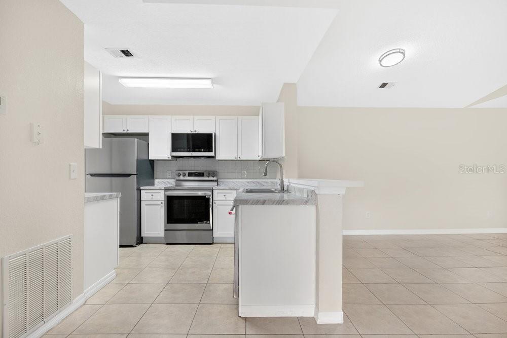 7606 Pissarro Drive, Unit 14305 Orlando, FL 32819 - Photo 10 of 49