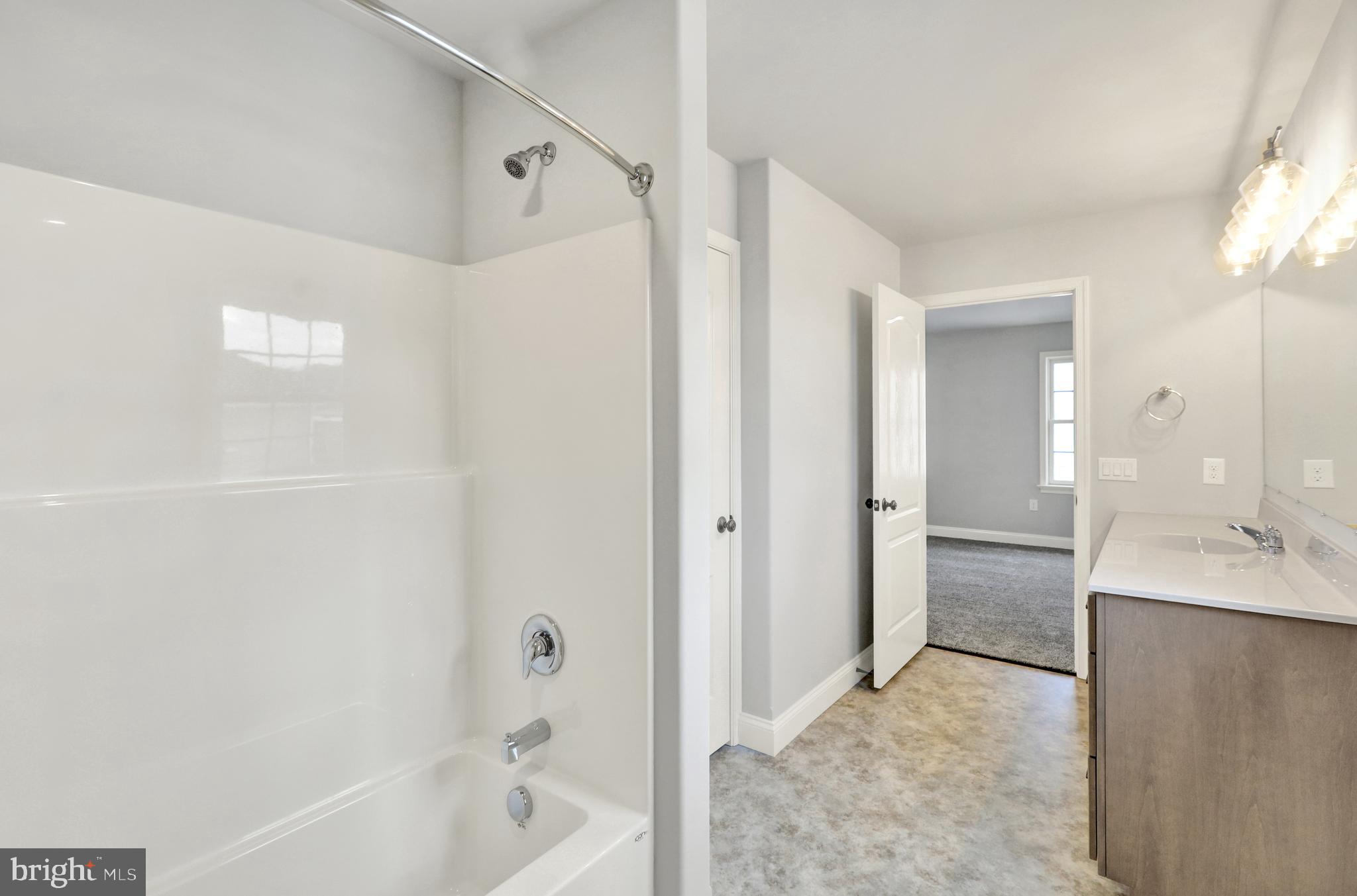 20 Rolling Meadow Road Lebanon, PA 17046 - Photo 22 of 31 a bathroom with a bathtub shower and a sink