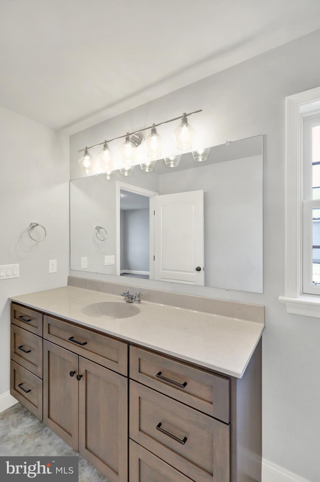 20 Rolling Meadow Road Lebanon, PA 17046 - Photo 23 of 31 a bathroom with a sink vanity and mirror