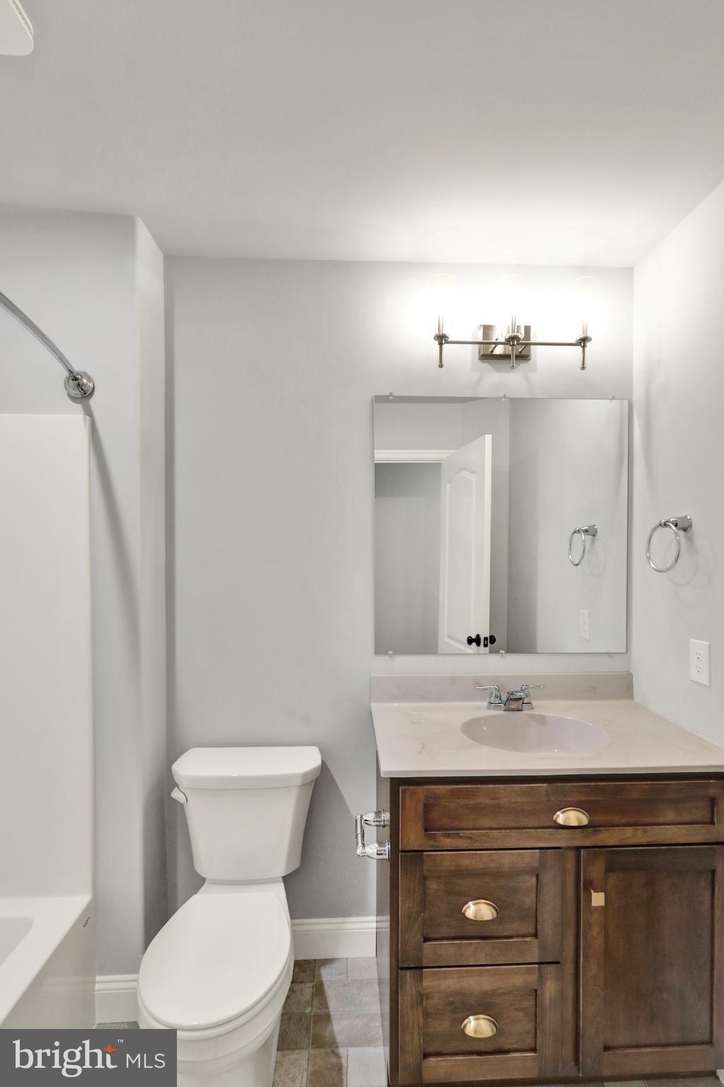 20 Rolling Meadow Road Lebanon, PA 17046 - Photo 25 of 31 a bathroom with a toilet a sink and mirror