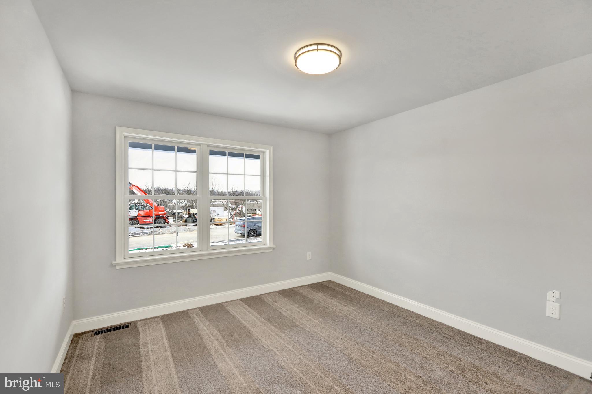 20 Rolling Meadow Road Lebanon, PA 17046 - Photo 28 of 31 an empty room with wooden floor and windows