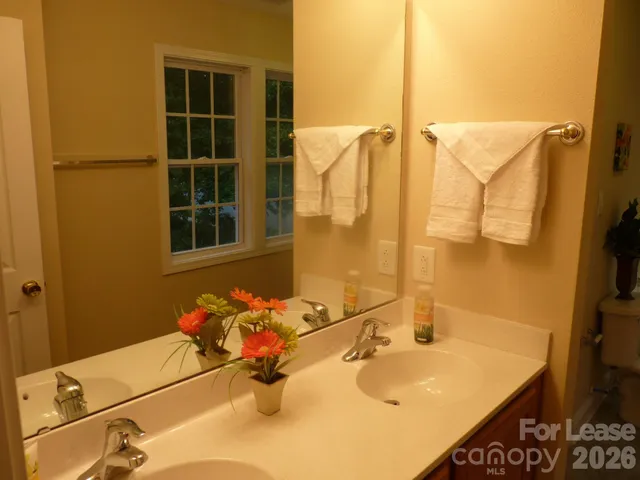 a bathroom with a toilet and a bathtub