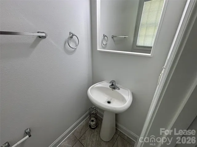 a sink and a toilet in a bathroom