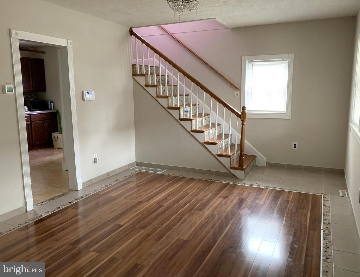38 Hazelhurst Avenue Ewing, NJ 08638 - Photo 3 of 10 a view of entryway and hall with wooden floor