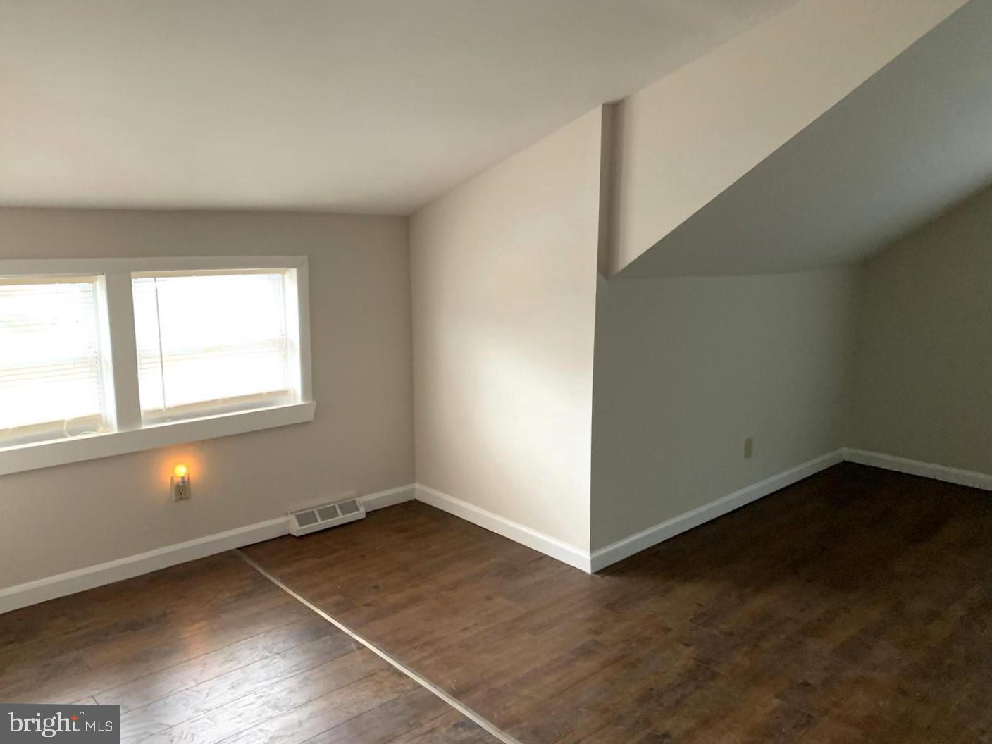 38 Hazelhurst Avenue Ewing, NJ 08638 - Photo 7 of 10 an empty room with a empty space and window