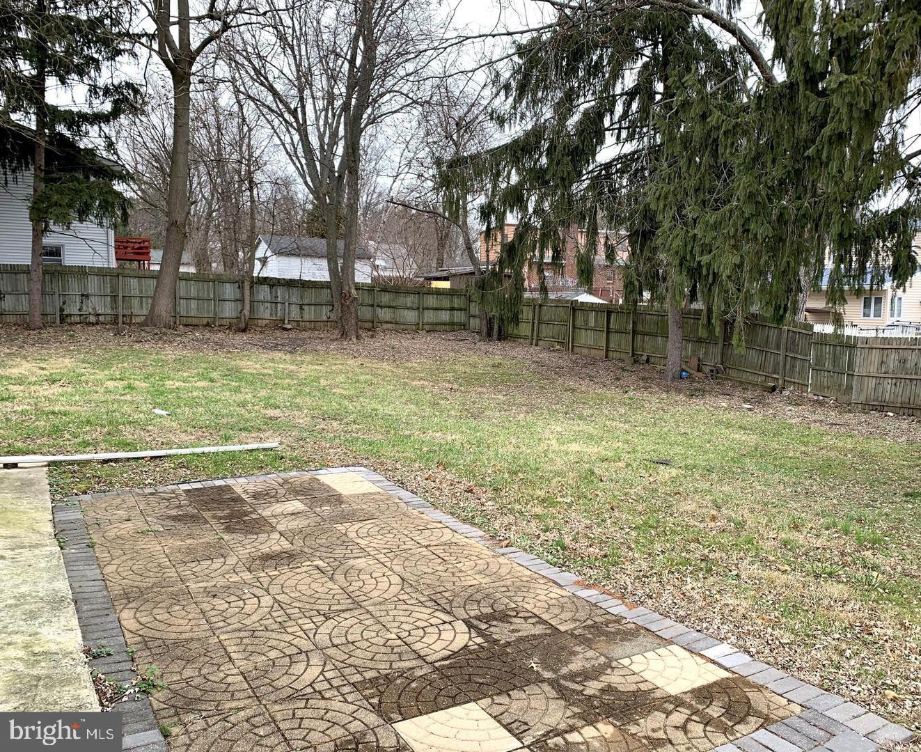 38 Hazelhurst Avenue Ewing, NJ 08638 - Photo 10 of 10 a backyard of a house with lots of green space