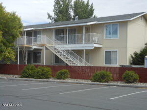 366 Quail Way Fallon, NV 89406 - Photo 1 of 18 a front view of a house with a yard and garage