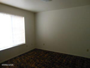 366 Quail Way Fallon, NV 89406 - Photo 11 of 18 a view of an empty room and window