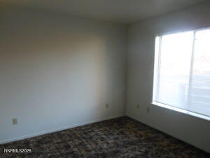 366 Quail Way Fallon, NV 89406 - Photo 12 of 18 an empty room with a window