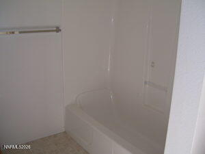 366 Quail Way Fallon, NV 89406 - Photo 18 of 18 a bathroom with a shower