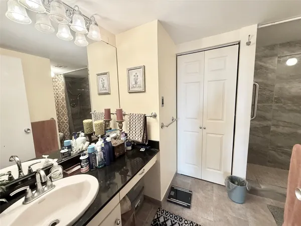 a room with furniture and a mirror