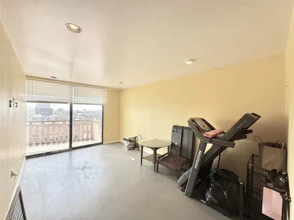 a view of workspace with furniture and windows