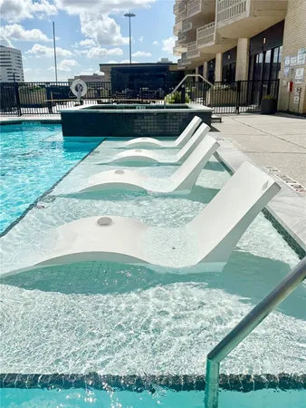 a view of outdoor space with swimming pool
