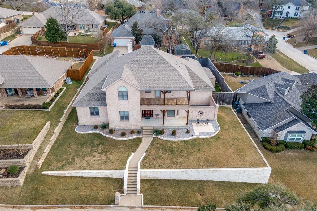 711 Ridgeview Drive Rockwall, TX 75087 - Photo 2 of 39 an aerial view of a house with swimming pool