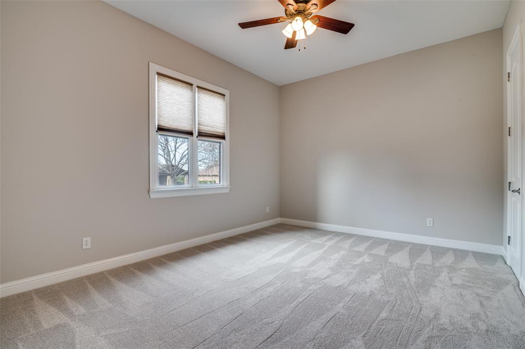 711 Ridgeview Drive Rockwall, TX 75087 - Photo 21 of 39 wooden floor in an empty room with a window