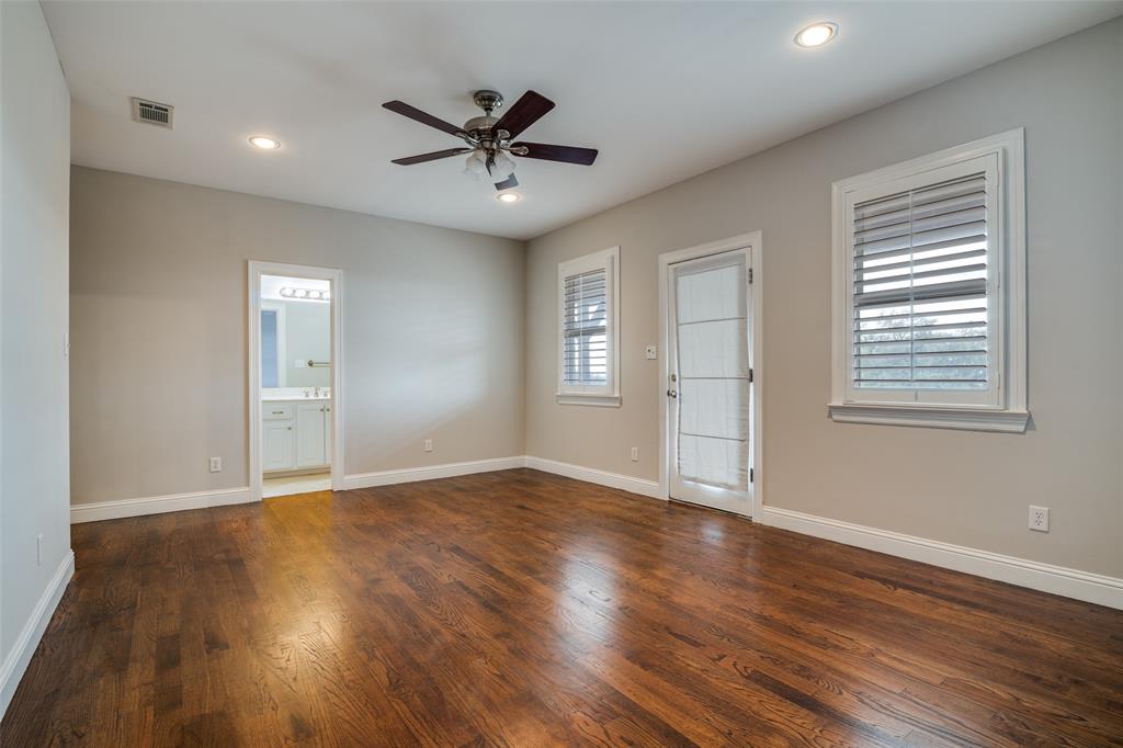 711 Ridgeview Drive Rockwall, TX 75087 - Photo 26 of 39 a view of empty room with wooden floor and fan