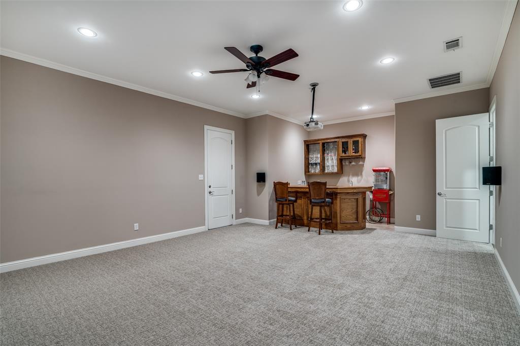 711 Ridgeview Drive Rockwall, TX 75087 - Photo 28 of 39 a view of a livingroom with furniture and a ceiling fan