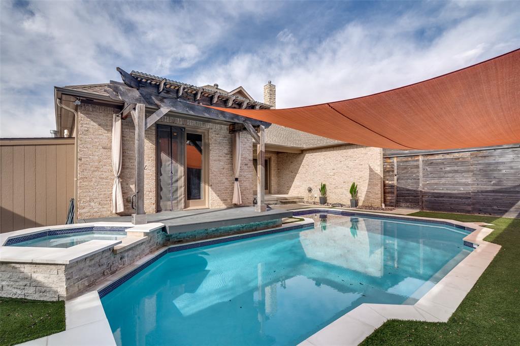 711 Ridgeview Drive Rockwall, TX 75087 - Photo 33 of 39 a view of a house with pool and chairs
