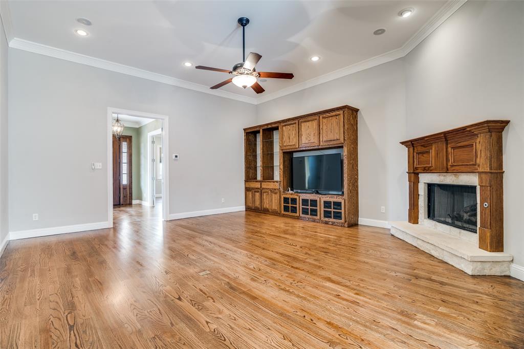 711 Ridgeview Drive Rockwall, TX 75087 - Photo 10 of 39 a view of an empty room with a fireplace and window