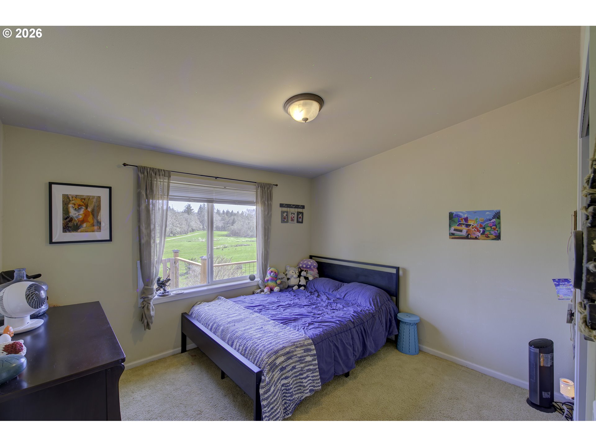 47 North Nemah Road East South Bend, WA 98586 - Photo 11 of 33 a bedroom with a bed and a desk