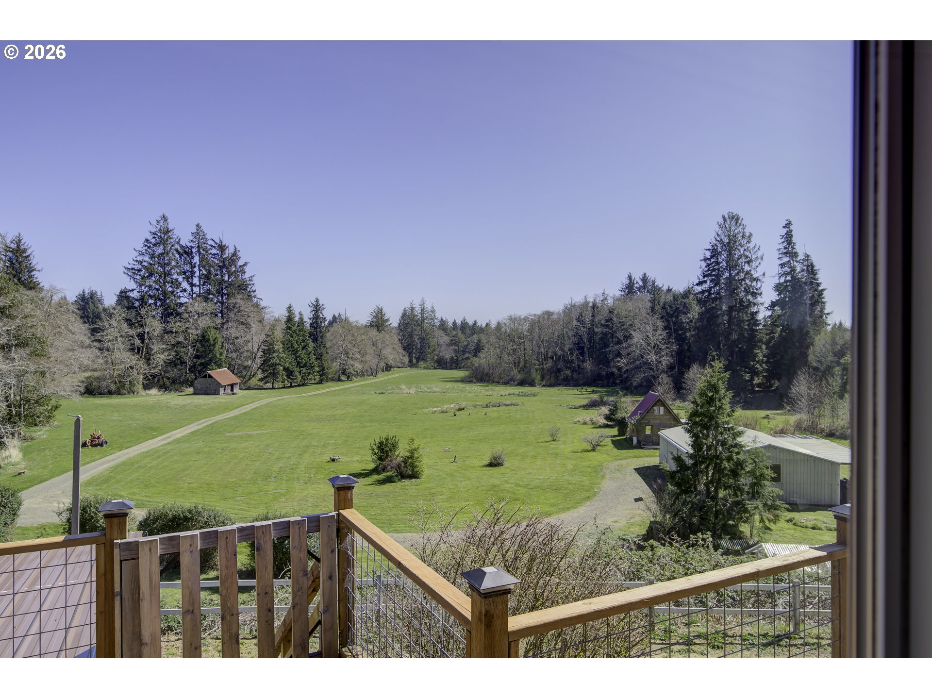 47 North Nemah Road East South Bend, WA 98586 - Photo 12 of 33 a view of a green field in front of the house