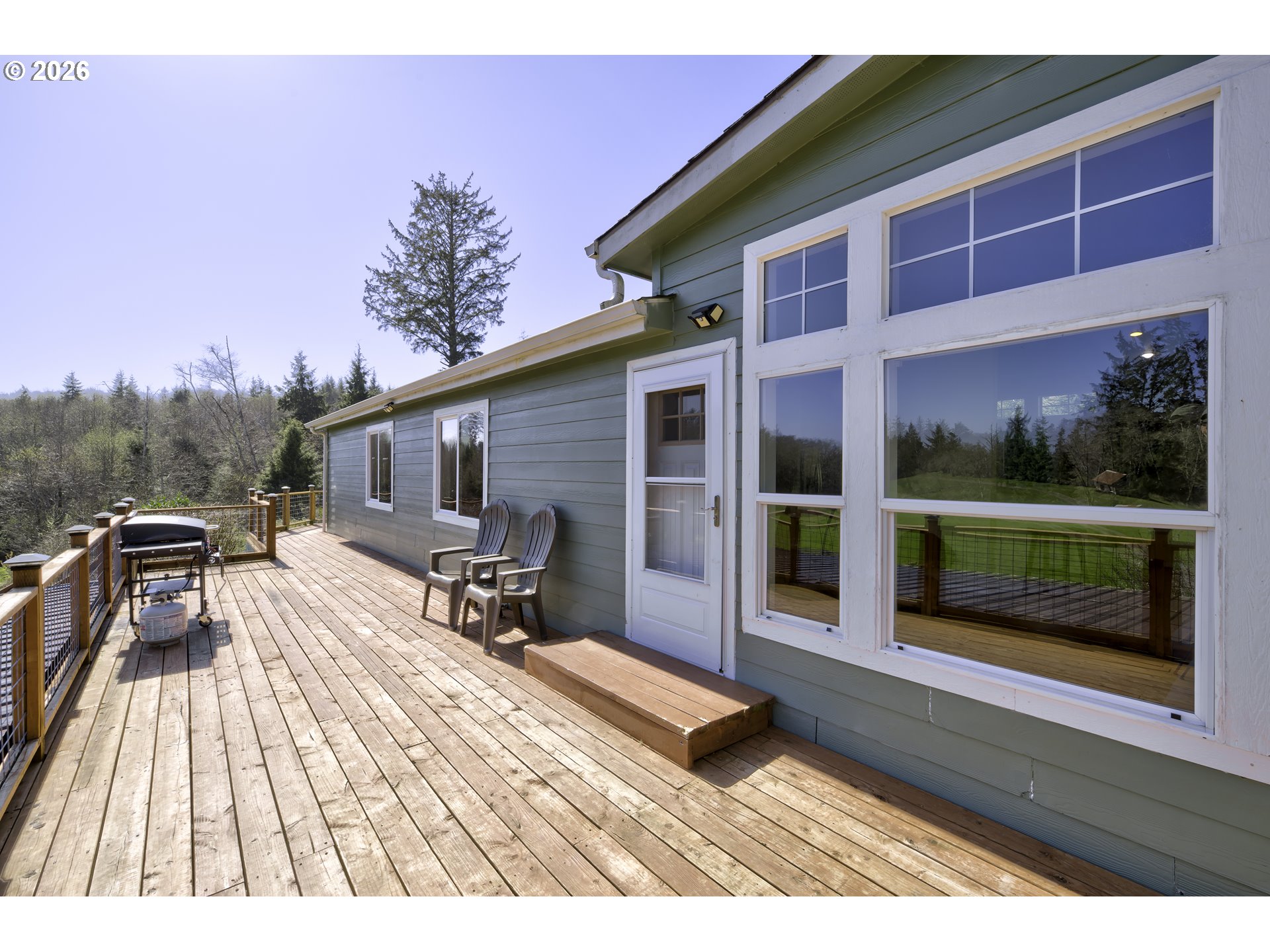 47 North Nemah Road East South Bend, WA 98586 - Photo 17 of 33 a house view with a seating space and garden view