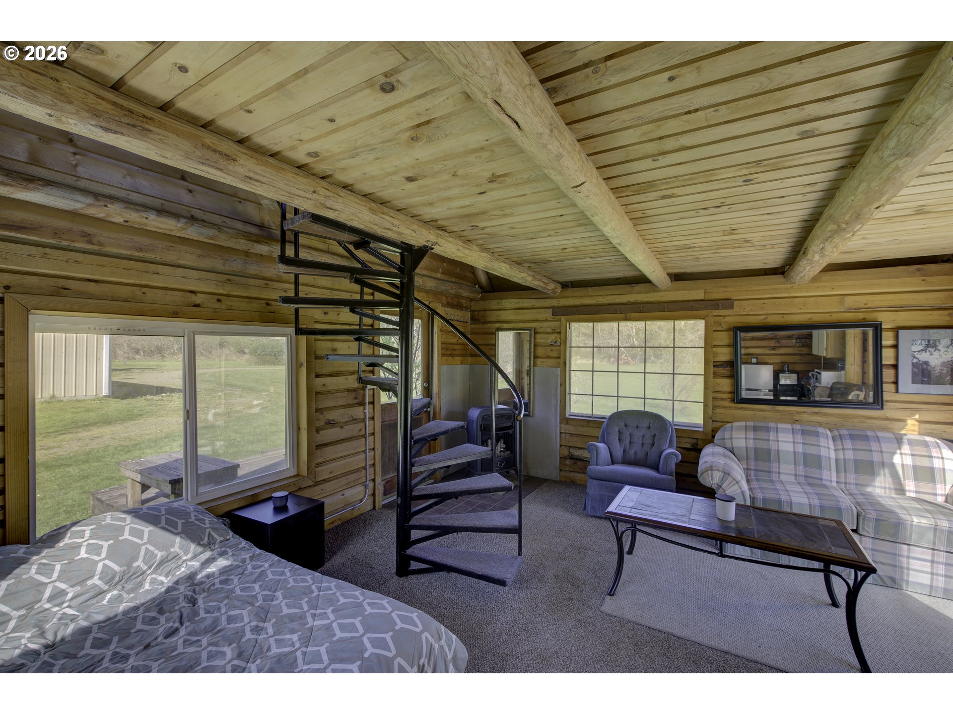 47 North Nemah Road East South Bend, WA 98586 - Photo 23 of 33 a living room with furniture and a large window