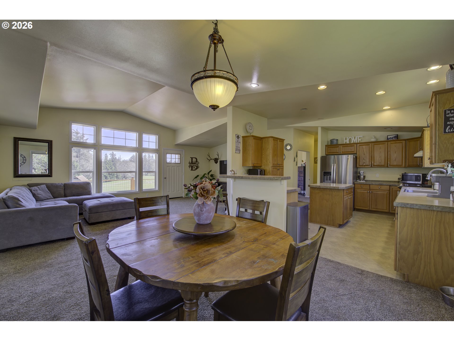 47 North Nemah Road East South Bend, WA 98586 - Photo 3 of 33 a view of a dining room with furniture and wooden floor